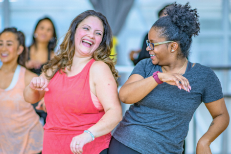 Two women dance