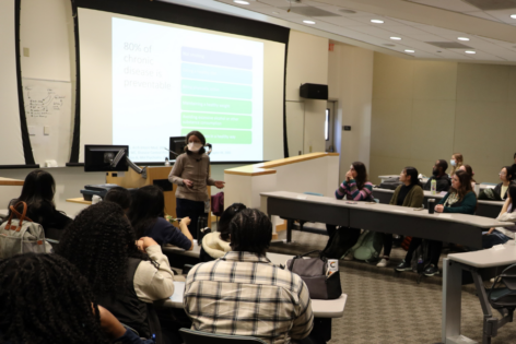 Class of students listen to lecture